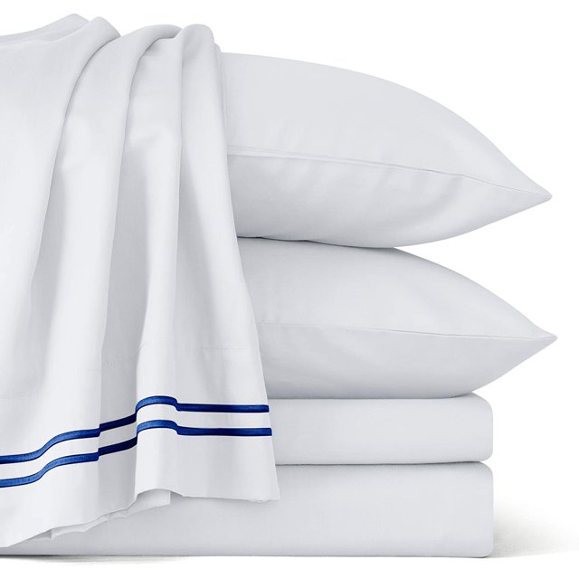 Subrtex Ensemble de Draps Doux en Coton et Tencil 1600 Fils Résistants aux Plis, Blanc, Comprenant un Drap Plat, un Drap-Housse et Deux Taies d'Oreiller Empilées Soigneusement. Conçu avec des Poches Profondes et un Élastique Tout Autour, le Drap-Housse Convient aux Matelas jusqu'à 16 Pouces. Fait de 40 % de Tencil et 60 % de Coton avec un Tissage Satin Lustré, Cet Ensemble de Draps Hypoallergéniques Est Résistant aux Plis, Respirant et Lavable à la machine.