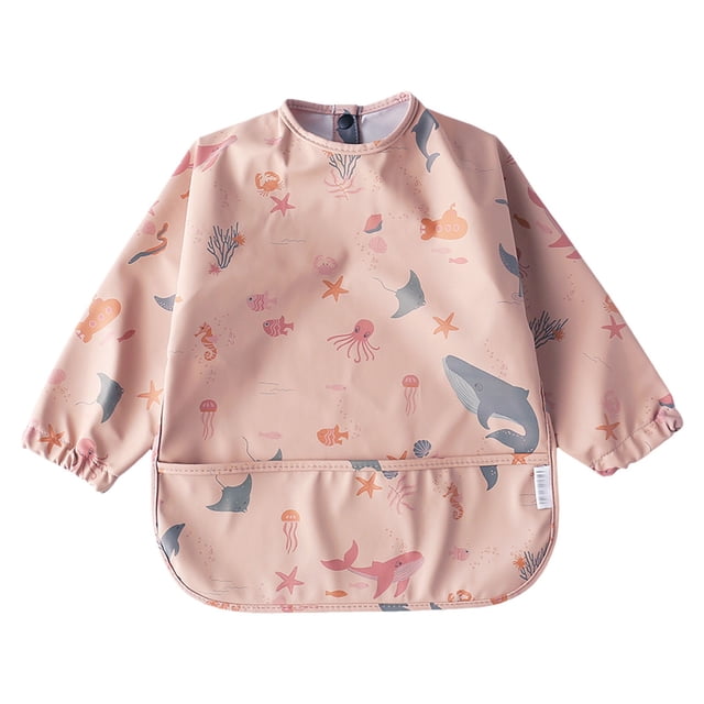 MIASHUI Baby Long Sleeve Bib with a cartoon print featuring underwater-themed illustrations like whales, starfish, and coral. Made from soft, lightweight, and breathable muslin fabric, this bib is designed for toddlers aged 6 months to 4 years. It includes elastic cuffs, a no-scratch closure, and a front pocket for catching spills, making it ideal for baby care, travel, and everyday use. Perfect as part of a baby outfit set and suitable for both baby boys and girls.