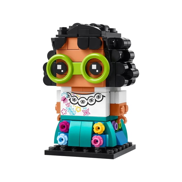 LEGO Brickheadz 40753 Mirabel Madrigal 179pcs, a buildable Disney Encanto collectible figure. The design features Mirabel's floral white blouse, blue skirt, and round green glasses, standing over 3.5 inches tall. Perfect for play, display, or collecting with other LEGO Disney sets.