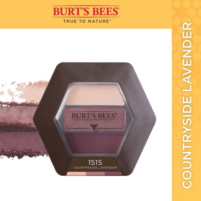 Burt’s Bees 100% Natural Eye Shadow Palette with 3 Shades in Countryside Lavender, a hexagonal compact containing three mineral eye shadows in beige, lavender, and plum tones, formulated with bamboo, honey, and vitamin E for nourishing, long-lasting, crease-resistant wear safe for sensitive eyes and contact lens wearers.