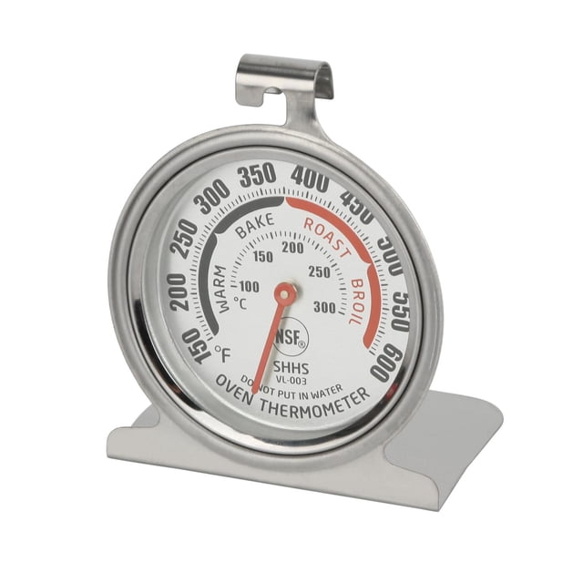 Mainstays Instant Read Stainless Steel Oven Thermometer with a large dial measuring 150 to 600°F, featuring blue and red zones for bake, roast, and broil, constructed from durable stainless steel with a hook and stand for hanging or standing in ovens, grills, or smokers.