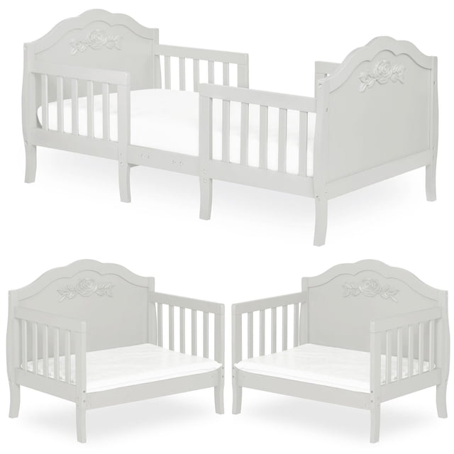 Lit pour Tout-Petit 3-en-1 Rose en Blanc avec Détails de Roses Sculptées sur la Tête de Lit et le Pied de Lit, Montré sous Forme de Lit pour Tout-Petit avec Quatre Barrières de Sécurité en Bois et Pattes Centrales Renforcées, et Converti en Deux Canapés Format Enfant, Fait de Bois Massif avec un design Bas au Sol pour la Sécurité des Tout-Petits.