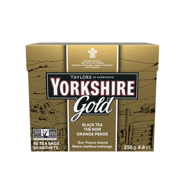 Yorkshire Black Tea Gold 80 Bags box with gold and black packaging, featuring Taylors of Harrogate branding and non-GMO verified label, containing 80 Orange Pekoe black tea bags weighing 250 g (8.8 oz), suitable for a strong, full-bodied cup of tea any time of day.