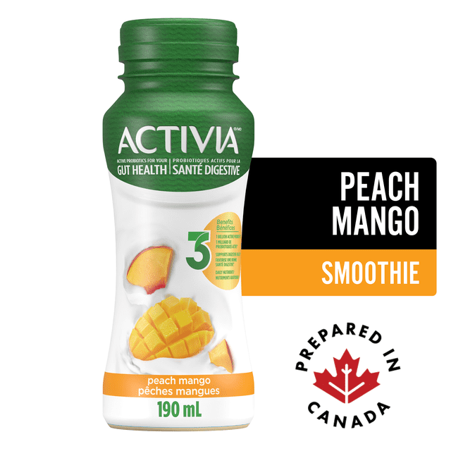 Activia Probiotic Yogurt Drink Peach-Mango Smoothie in a 190 ml white and green plastic bottle showing peach and mango pieces, featuring probiotics for gut health, prepared in Canada, suitable as a nutritious snack.