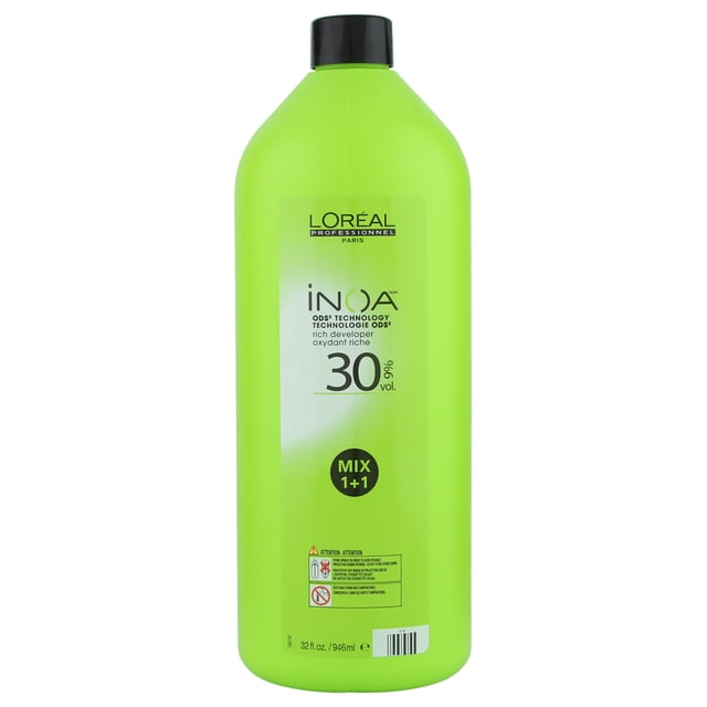 L'Oreal Professionnel Inoa Rich Developer 30 Volume Liter in a vibrant green 946ml bottle with a black cap. The label highlights ODS2 technology for ammonia-free permanent hair color, offering gentle lightening and up to 100% white hair coverage.