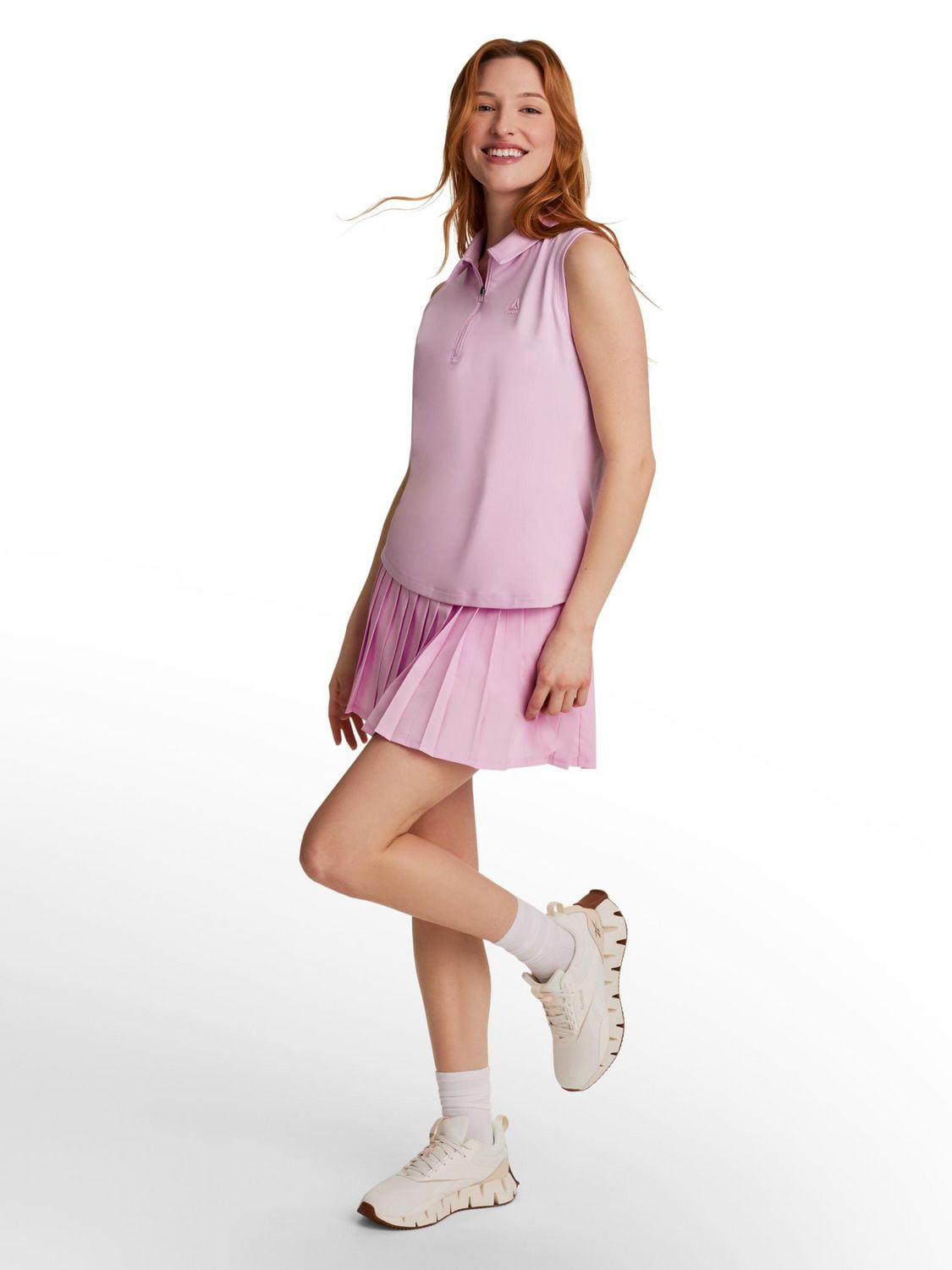 Reebok Polo sans manches Baseline pour femmes