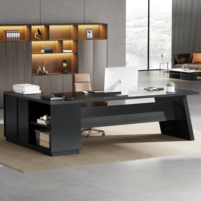 Tribesigns L-Shaped Executive Desk, 78-inch modern office desk with drawers and lateral file cabinet, designed for corner office spaces. It features a spacious black surface, two regular drawers, a lateral file drawer, and four open shelves for organized storage. The desk is displayed in a contemporary office setting with grey walls, built-in shelving, and large windows.