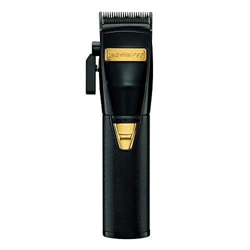 BaBylissPRO Black FX Cordless Clipper with a sleek black finish, gold accents, precision blades, and ergonomic grip for professional hair cutting and styling. Designed for cordless convenience, it is displayed in a front-facing view against a plain white background.