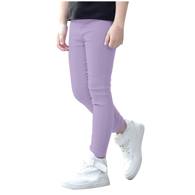 GDREDA Girls' Basic Solid Full Length Cotton Soft Leggings in purple, designed for 7-8 years old. These stretch pencil skinny pants feature an elastic waistband for comfort and are made from a soft, breathable blend material. Ideal for casual wear, child photography, and outdoor activities. Displayed on a child wearing white sneakers and a black top.