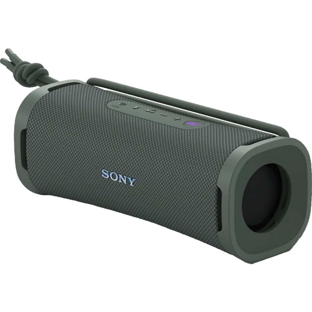 Sony ULT FIELD 1 Wireless Portable Speaker in forest gray with a compact cylindrical shape, mesh fabric covering, rubberized ends, and top control buttons. Features a detachable multi-way strap and IP67 waterproof, dustproof, rustproof, and shockproof design with up to 12 hours battery life, ideal for outdoor adventures.