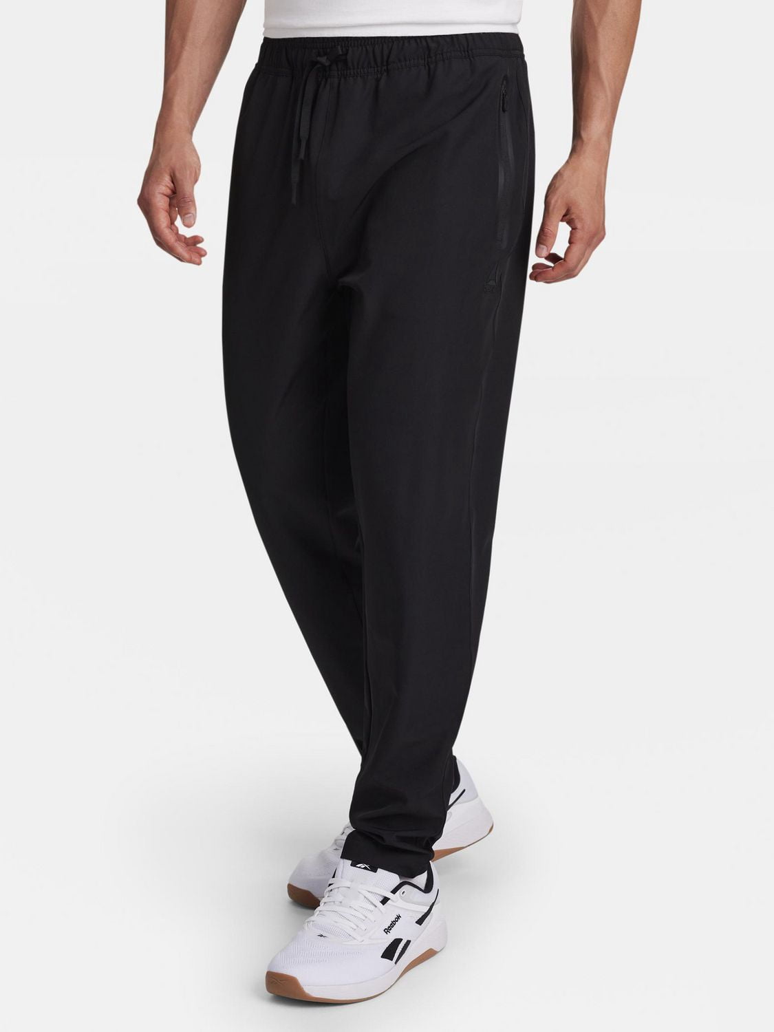 Reebok Pantalon fuselé tissé urbain pour homme