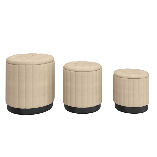 Modern Fabric and Stainless Steel 3pc Round Storage Ottoman Set in beige and black, featuring three vertically tufted round ottomans with fabric upholstery and matte black metal bases. Each ottoman provides ample storage and nests inside the larger piece for easy decluttering, ideal for living room seating and storage.