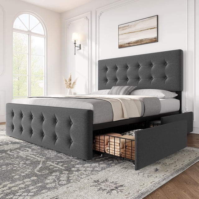 Bed Frame with 4 Storage Drawers and Adjustable Headboard, upholstered in dark grey linen fabric with button-tufted design. This storage bed features a sturdy mattress foundation with no box spring needed, suitable for 8-12 inch mattresses. Includes spacious wire netting drawers for organizing bed sheets and accessories, and an adjustable headboard for added comfort. Displayed in a bright, elegant bedroom setting with natural light and decorative accents.