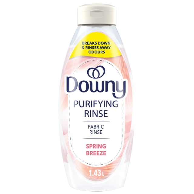 Downy Fabric Rinse Laundry Odour Remover Spring Breeze scent 1.43 L clear plastic bottle with white flip-top cap labeled Purifying Rinse fabric rinse that breaks down and rinses away odours, safe for all fabrics and gentle on skin, ideal for refreshing laundry quickly