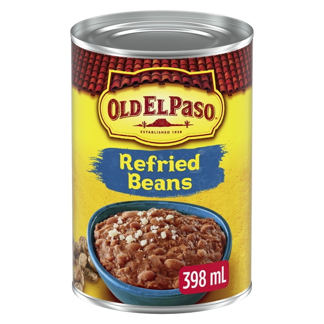Old El Paso Mexican Refried Beans, Pinto Beans, 398 ml can with yellow label featuring a red tile roof design and a blue bowl of refried pinto beans topped with white cheese crumbles, suitable as a side dish or for creating layered bean dips.
