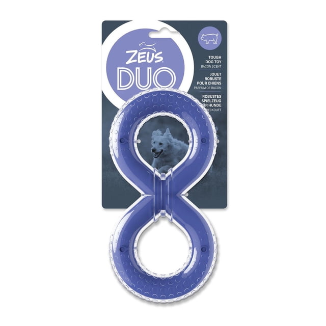 Zeus Duo Figure-8 Tug, Bacon Scent durable dog chew toy shaped like a figure-8 with a blue nylon core and clear textured thermoplastic rubber coating, packaged on a blue card with a white dog image and Zeus Duo branding, suitable for chewing and tug play.
