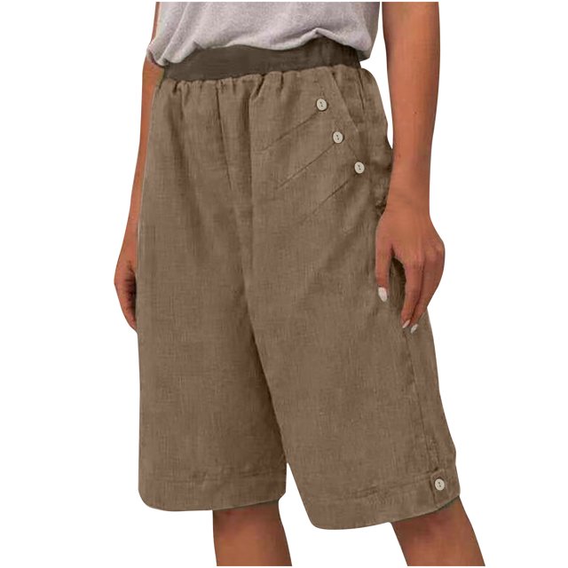 Pantalon à Taille Élastique pour Femmes en 60 % Coton et 40 % Lin, Illustré en Couleur Unie Brune avec un design capri à Jambe Droite. Comprend une Taille Élastique, des Boutons Latéraux et un Tissu Léger Adapté aux Tenues Décontractées, aux occasions de Printemps et d'Été.