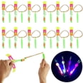 thumbnail image 1 of 12Pcs Amazing LED Light   Helicopter Flying Toy Elastic Slingshot Flying Copters Party Fun Gift For Kids, 1 of 8