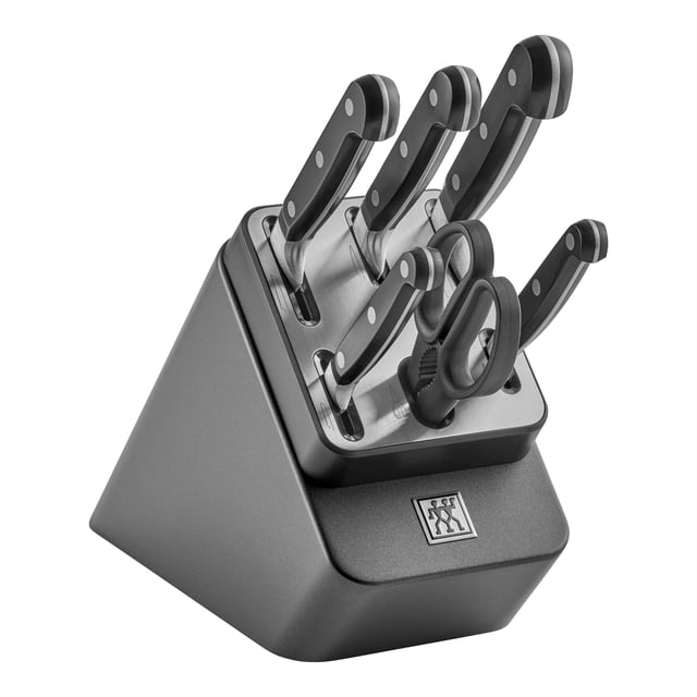 ZWILLING Professional S 7 Piece Knife Block Set in anthracite, designed for precision and durability. Includes five knives: paring knife, serrated utility knife, carving knife, chef's knife, and bread knife, plus TWIN L multi-purpose shears. The self-sharpening block features integrated ceramic grinding elements for automatic sharpening with every use. Ideal for kitchen cutlery storage, the FSC-certified silver-grey block enhances knife longevity and performance.