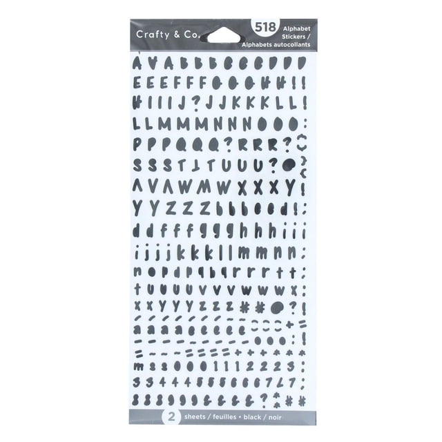 CRAFTY & CO. Alphabet Stickers Black Cursive, 52 pcs featuring two sheets of black cursive alphabet letters and punctuation marks on white backing, ideal for decorative crafts, scrapbooking, and personalizing notebooks.