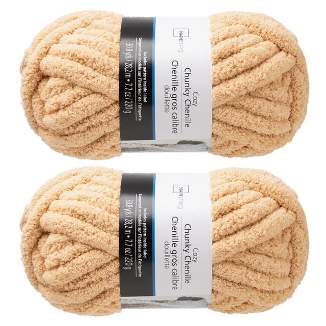 Cozy Chunky Chenille Yarn 2-pack by Mainstays, featuring two beige skeins of thick polyester chenille yarn, each measuring 30.8 yards (28.2 meters) and weighing 7.7 ounces (220 grams), suitable for knitting chunky blankets, pillows, and scarves with included pattern instructions.