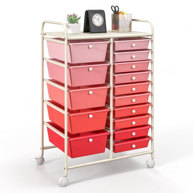 Costway 15 Drawer Rolling Storage Cart Tools Scrapbook Paper Office School Organizer in pink with a white metal frame. Features 15 removable drawers in gradient pink shades, including 5 large and 10 small drawers, and a spacious top shelf for additional storage. Equipped with 4 smooth-rolling casters, 2 of which are lockable, for easy mobility and stability. Made with a sturdy baking-painted metal frame and lightweight PP drawers, suitable for home, office, school, or studio use.
