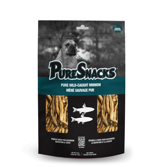 PureSnacks Freeze Dried Dog Minnow 3.5oz | 100g resealable bag showing wild-caught minnow dog treats through two clear windows on a black and teal package with white fish illustrations and bilingual English-French text highlighting freeze drying for maximum nutrition and taste.