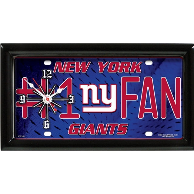NFL New York Giants Wall Clock with a 1-inch black satin-finished frame, mounted on a rectangular metal license plate featuring a blue textured background and bold red and white team graphics reading 'NEW YORK', '#1 ny FAN', and 'GIANTS'. The clock includes black hour and minute hands, a red second hand, and white numbers at 12, 3, 6, and 9. Ideal for sports memorabilia collections, fan caves, or offices.