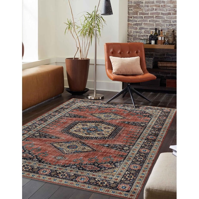 ECARPET Tracy Traditional Area Rug displaying Persian-inspired medallion and floral patterns in red, blue, ivory, and gold, set on dark hardwood flooring in a living room with a brown leather swivel chair with beige cushion, tall potted plant, floor lamp, and exposed brick wall with shelving, suitable for adding classic style to various interior spaces.