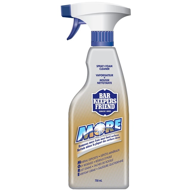 Bar Keeper's Friend MORE Spray & Foam Cleaner 25.4 oz bottle with white and blue trigger spray, gold and silver label detailing removal of mineral deposits, oily residues, rust stains, and everyday grime from hard surfaces, bilingual English and French text, 750 mL capacity, ideal for kitchen and bathroom use.
