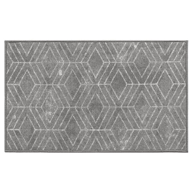18-inch x 30-inch Malika Grey Printed Floor Mat with a two-tone grey and white geometric diamond pattern, made of durable, stain-resistant polyester yarns tufted in level loop pile, backed with latex rubber gel foam to prevent slipping, ideal for mudrooms or vestibules and easy to clean by vacuuming or machine washing.
