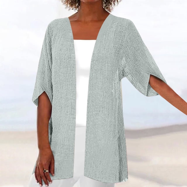 CFLVAEK Plus Size Women Fall Cardigan Casual Short Sleeve Duster Cardigans in a breathable solid cotton material. This light grey cardigan features a draped open front design with short sleeves, styled over a white top. Suitable for casual wear, women's tops, or as a lightweight beach cover-up.