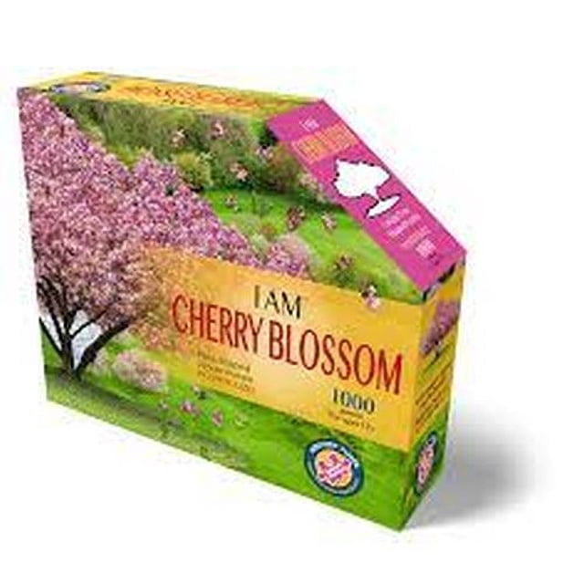 MADD CAPP Je Suis en Forme d'Arbre de Fleurs de Cerisier Casse-Tête de 1000 Pcs. la Boîte Affiche un Arbre de Fleurs de Cerisier vibrant en Pleine Floraison avec un Fond Vert Luxuriant. Ce Casse-Tête Unique en Forme d'Arbre Contient 1000 Pcs. Ne Convient Pas aux Enfants de Moins de 3 Ans en Raison de Petites Pièces, Tel Qu'indiqué par l'Avertissement de Danger d'Étouffement.