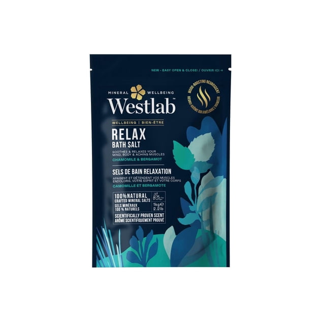 WESTLAB RELAX BATH SALTS 1KG pouch with 100% natural mineral salts infused with chamomile and bergamot essential oils, scientifically proven to soothe muscles and promote mind and body relaxation, featuring blue and green floral designs on dark blue packaging.