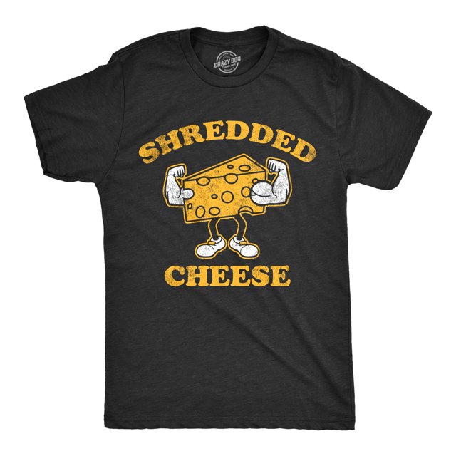 Mens Shredded Cheese T Shirt Funny Cheesy Buff Workout Joke Tee for Guys in Heather Black, size L. The shirt features a humorous graphic of a cartoon cheese block with muscular arms and legs, flexing under the text 'Shredded Cheese' in bold yellow font. Made from soft cotton, this slim-fit tee is machine washable and designed by Crazy Dog T-Shirts.