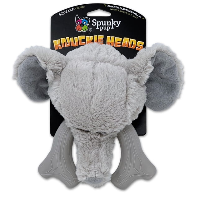 Knuckleheads 2-in-1 Elephant Dog Toy by Spunky Pup featuring a front-facing light grey plush elephant head with soft fabric ears and double-stitched seams, integrated with a chicken-flavored nylon chew toy shaped as tusks with dental texture to promote healthy teeth and gums, attached to black packaging with orange branding.