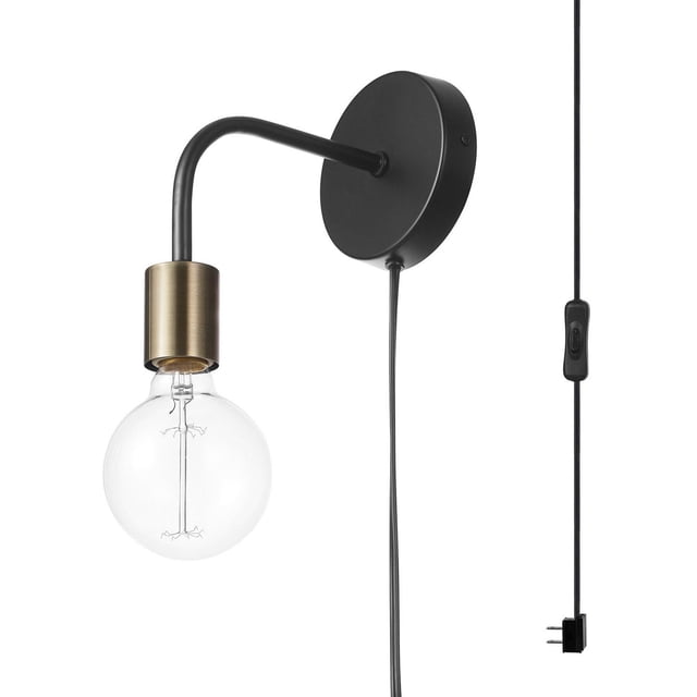 Holden 1-Light Long Arm Matte Black Plug-In or Hardwire Wall Sconce with Matte Brass Socket featuring a matte black round wall mount and curved arm holding a matte brass socket with a clear globe bulb, connected to a black cord with inline switch and plug for versatile home lighting installation, suitable for ambient accent lighting.
