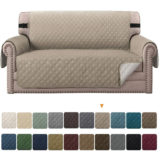JUNWELL 100% waterproof sofa cover in brown, designed for oversized sofas with a quilted texture and reversible design. Features elastic straps for a secure fit, anti-slip technology, and machine washable fabric. Suitable for protecting furniture from pets, children, and spills. Displayed on a beige sofa with multiple color options shown below.