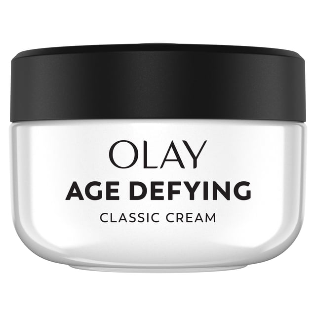 Olay Anti-Aging Night Cream, hydrating and brightening face moisturizer in a white jar with a matte black lid, labeled with bold black text. This classic cream provides intense overnight hydration, reduces fine lines, and suits all skin types, ideal for anti-aging skincare routines.