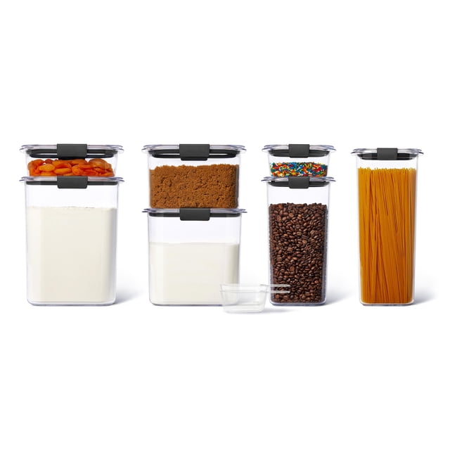 Rubbermaid Brilliance Pantry Set, clear airtight food storage containers with black latched lids made of shatter-resistant Tritan plastic, includes seven stackable containers filled with flour, dried apricots, brown sugar, powdered sugar, coffee beans, rainbow sprinkles, and spaghetti, plus two 1/2-cup scoops, ideal for organized kitchen pantry storage and easy ingredient visibility.