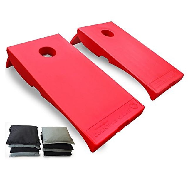 Driveway Games All Weather Cornhole Set featuring two red weatherproof regulation-size cornhole boards (2x4 feet) and eight regulation-size bean bags in black and gray. The boards are made of heavy-duty plastic with built-in locking bean bag storage for portability and durability. Suitable for outdoor use on various surfaces, including lawns, patios, and poolside. Includes cornhole rules for family-friendly gameplay.