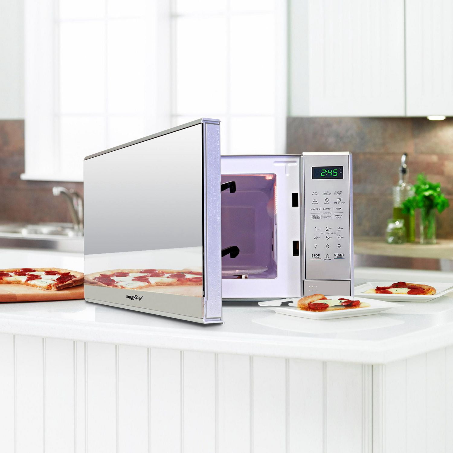 Micro-ondes de comptoir Total Chef en acier inoxydable, 0,7 pi³ (environ 20 L), avec affichage numérique à DEL, 700 watts