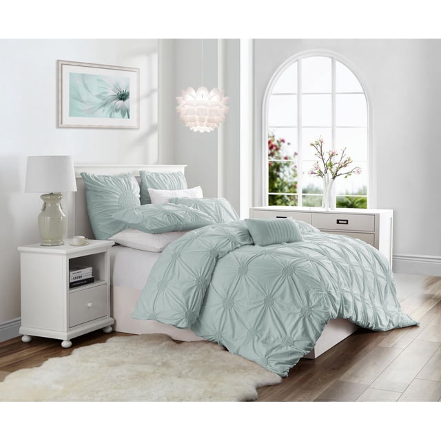 Luxury Floral Ruched High Quality Duvet Cover Set in soft light blue microfiber fabric with wrinkle-resistant floral ruched stitching on duvet and pillow shams, displayed on a bed in a bright bedroom with white furniture and hardwood floors, ideal for elevating bedroom decor.