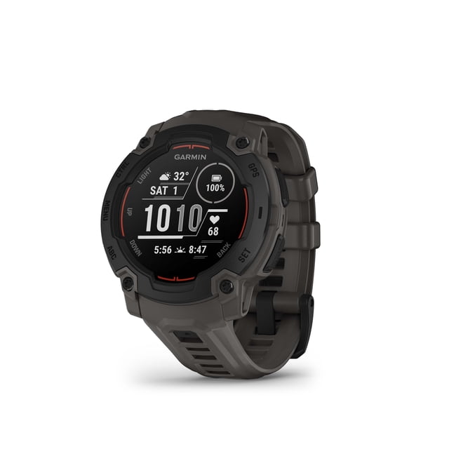 Garmin Instinct® E GPS Smartwatch - 45-mm - Charcoal shown in a 3/4 front view with a round digital display featuring time, date, temperature, battery level, and heart rate. The rugged charcoal case has visible screws and a textured silicone strap with buckle. It is water-rated to 10 ATM, engineered to MIL-STD-810 for shock and thermal resistance, and includes multi-GNSS, 3-axis compass, and barometric altimeter for reliable outdoor navigation and health monitoring.