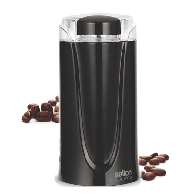 Salton Essentials Black Electric Coffee and Spice Grinder with a sleek black design and a transparent lid. Features a high-speed stainless steel blade for grinding coffee beans, herbs, and spices. Includes one-touch control and a powerful 150-watt motor for adjustable grinding from coarse to fine. Coffee beans are displayed around the grinder for context.