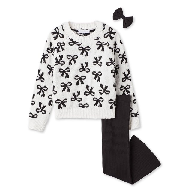 Btween toddler girls' sweater 3-piece set with a white matte chenille knit sweater featuring black bow patterns, crew neckline, long raglan sleeves, and ribbed trim, paired with black ribbed flared leggings with elasticized waistband and a matching black bow clip for a cozy, stylish outfit.