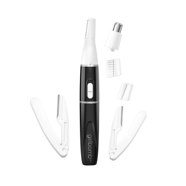 Girl Bomb All-In-One Trimmer with black and white body, featuring a detail trimmer head attached, two foldable dermablade razors, a nose trimmer head, and two white comb attachments for personal grooming and facial hair trimming on a white background.