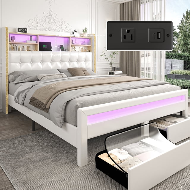 SIBEDS Bed Frame with Bookcase Storage Headboard and 2 Drawers PU White Upholstered Tufted Wingback Beds, Full. This modern bed frame features a diamond-tufted PU leather headboard with customizable LED lighting and a built-in charging station (1 AC outlet, 1 USB port, 1 USB-C port). The headboard includes 5 open shelves for storage, while the foot of the bed has 2 large pull-out drawers on wheels. The sturdy wooden-slatted platform frame provides noise-reducing, anti-slip support and does not require a box spring. Shown in a bright bedroom setting with a soft rug and natural light.