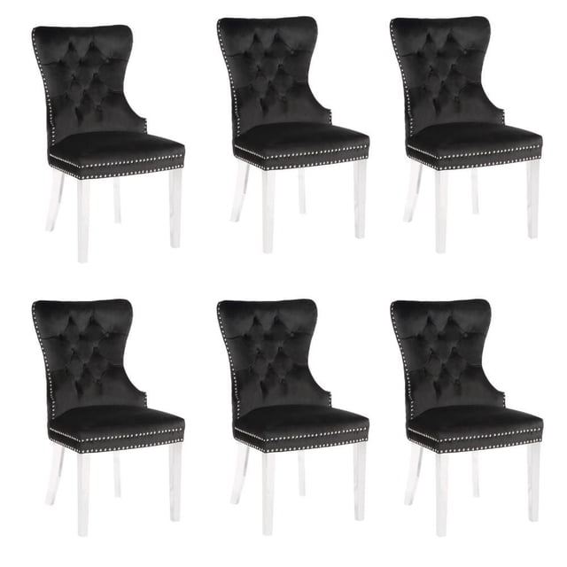 WINGBACK DINING CHAIR in Black SET OF 6 with black velvet upholstery, diamond tufted wingback backs, nailhead trim, wooden frames, and polished stainless-steel legs, arranged in two rows on a white background, ideal for kitchen and dining seating and often used as stylish accent chairs.