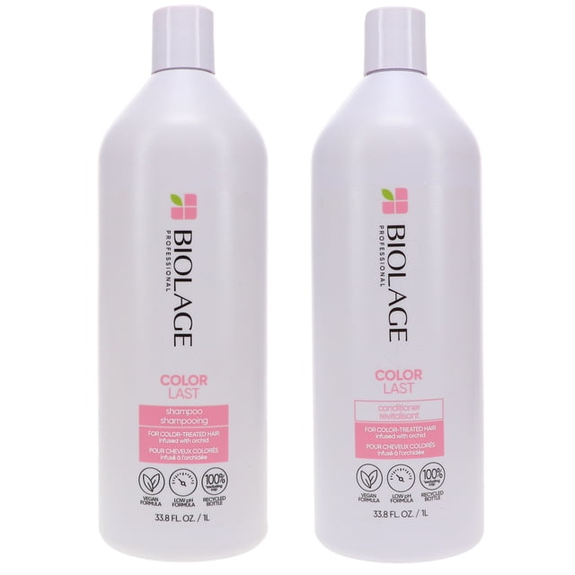 Matrix Biolage Colorlast Shampooing 33,8 oz et Revitalisant Colorlast 33,8 oz, Paquet Combiné. Deux Grands Bouteilles avec Emballage Blanc, accents Roses et Image de Marque Biolage. Cet Ensemble Professionnel de Soins Capillaires Est Conçu pour des Cheveux Colorés, avec un Shampooing Qui Nettoie en Douceur et un Revitalisant Qui Démêle et Ajoute de la Brillance. Les Deux Sont Sans Parabènes et à pH Bas, Aidant à Maintenir une Couleur de Cheveux Vibrante jusqu'à Neuf Semaines.